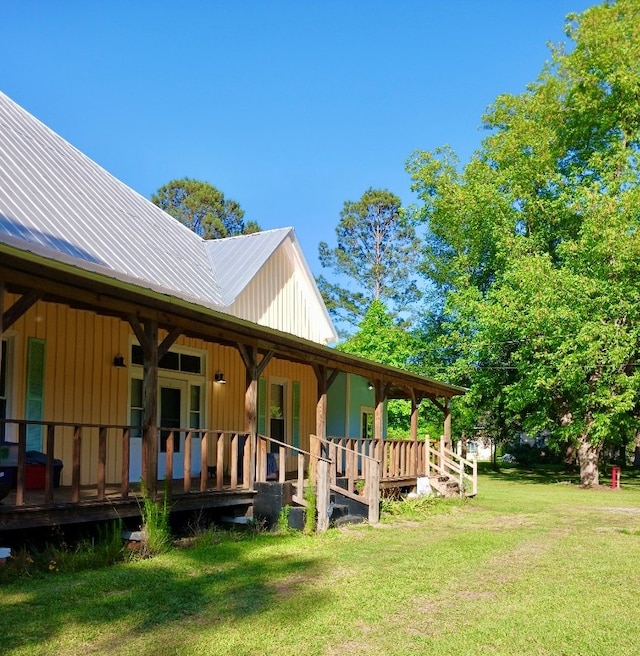 back of property with a yard