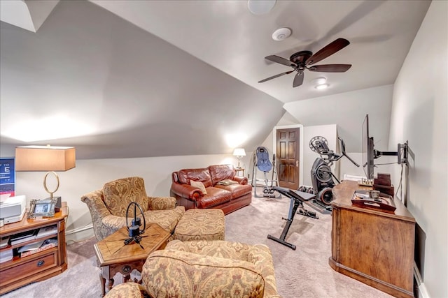 carpeted office featuring vaulted ceiling and ceiling fan