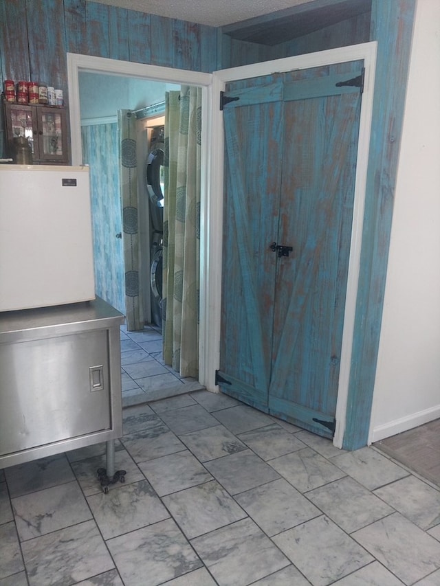 480 Spring Creek Rd, Warwick, GA 31796 - bathroom featuring stacked washing machine and dryer