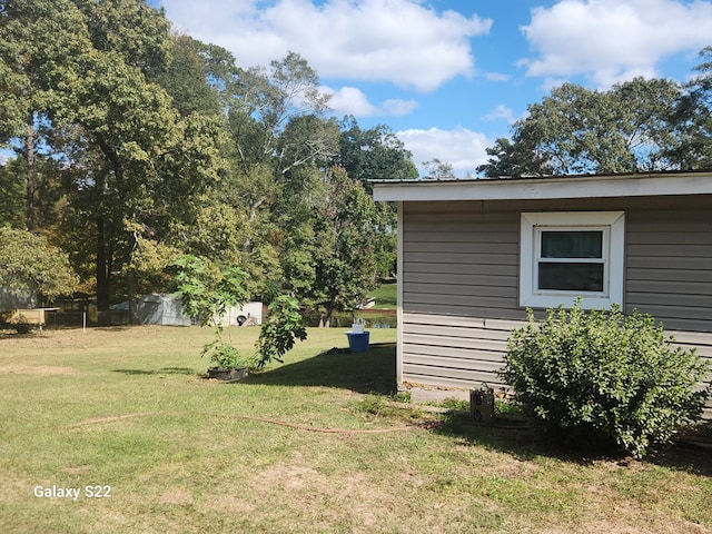480 Spring Creek Rd, Warwick, GA 31796 - view of property exterior featuring a yard