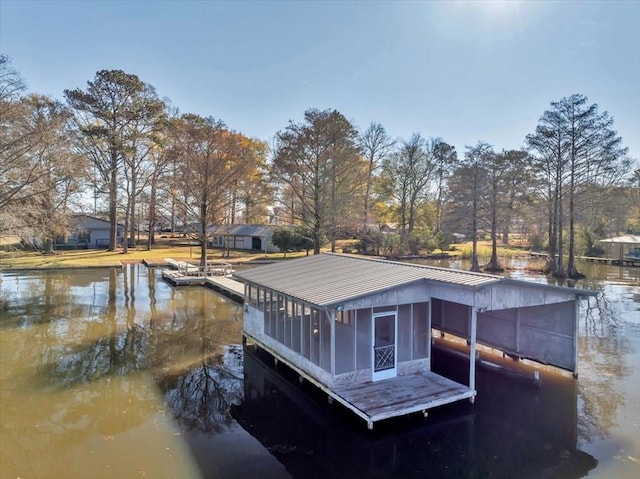 dock area with a water view