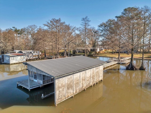 dock area with a water view