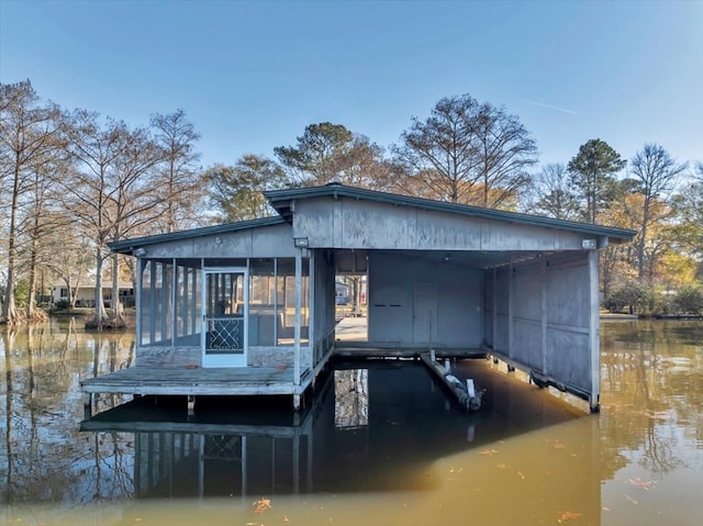 dock area featuring a water view