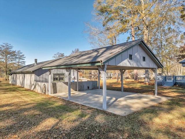 exterior space featuring a gazebo, a lawn, a deck, and a patio