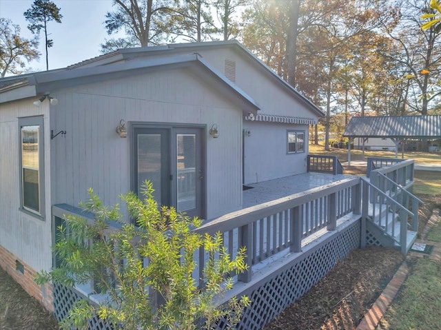 exterior space featuring a wooden deck