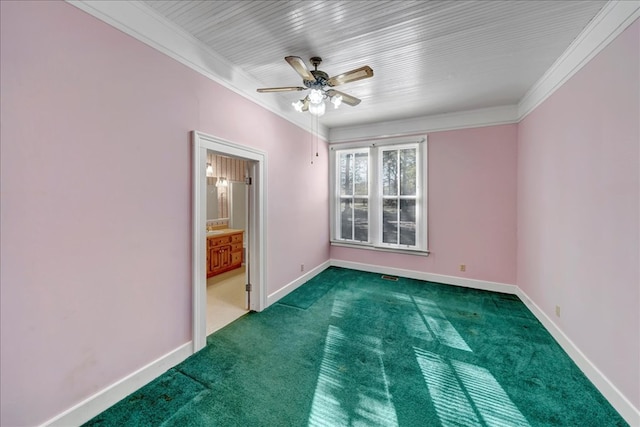 carpeted empty room featuring crown molding and ceiling fan