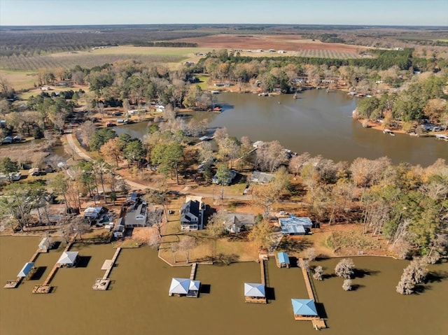 bird's eye view with a rural view and a water view