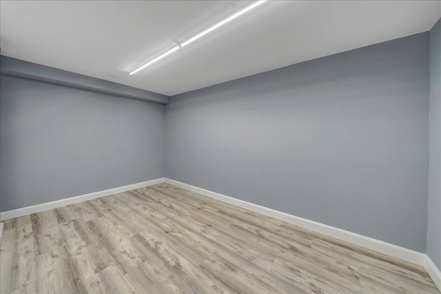 unfurnished room featuring light hardwood / wood-style floors