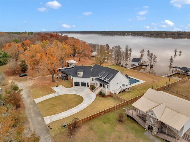 drone / aerial view with a water view