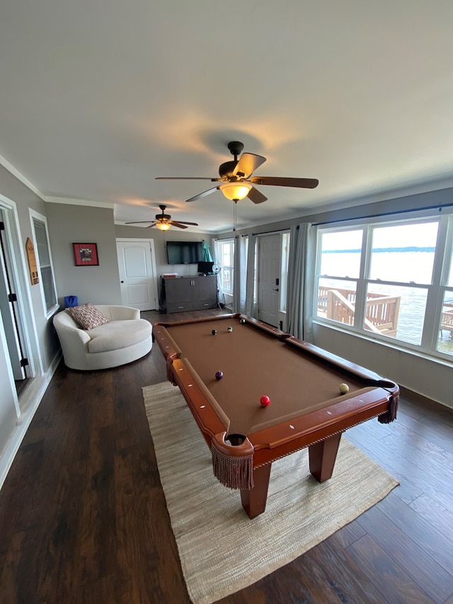 recreation room with wood finished floors, a ceiling fan, crown molding, baseboards, and pool table