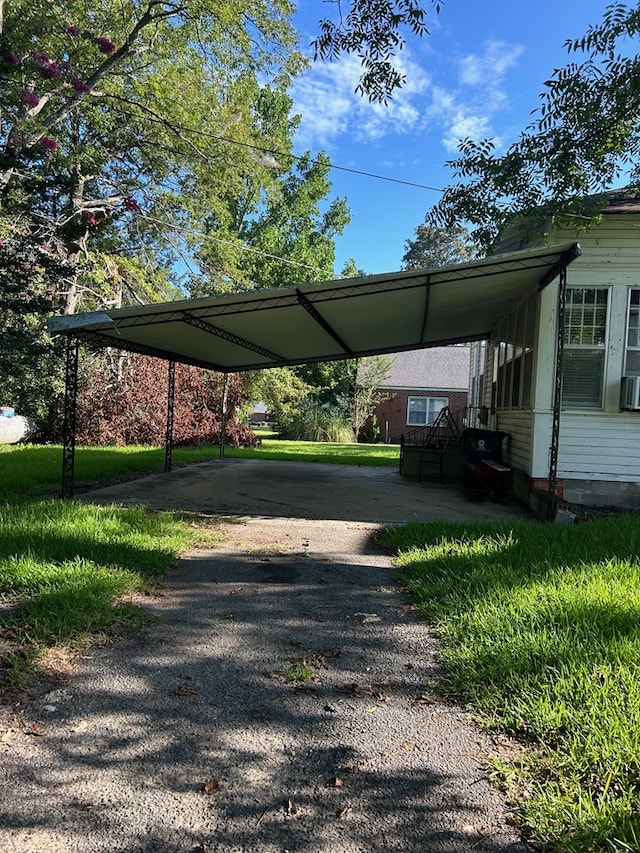 view of car parking featuring a carport