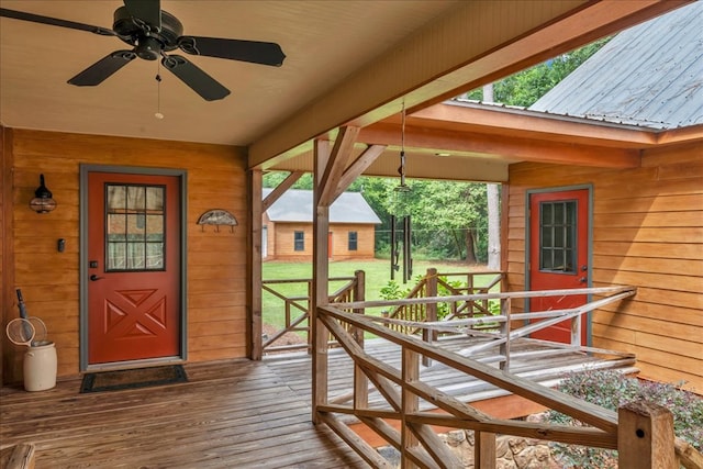 exterior space featuring ceiling fan