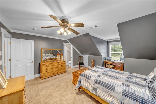 carpeted bedroom with ceiling fan, crown molding, and vaulted ceiling