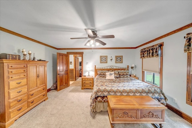 carpeted bedroom with crown molding and ceiling fan