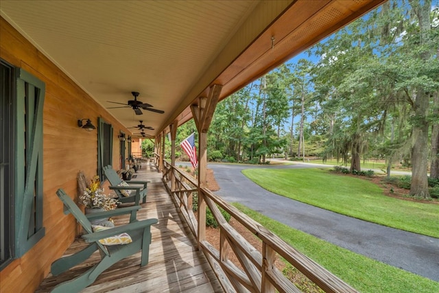 exterior space featuring a porch and ceiling fan