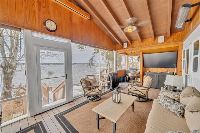 sunroom / solarium featuring wood ceiling and vaulted ceiling with beams