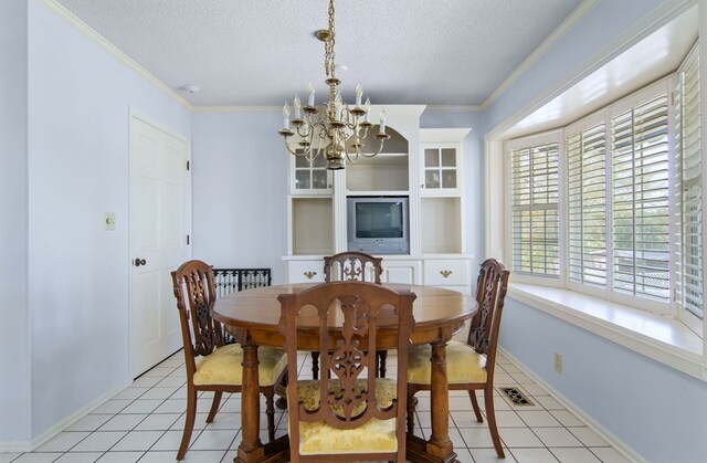 tiled dining area with an inviting chandelier, a textured ceiling, and crown molding