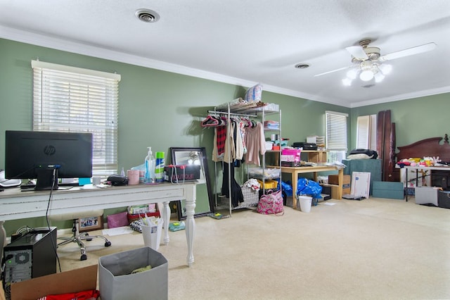 office space featuring ceiling fan, a textured ceiling, and crown molding