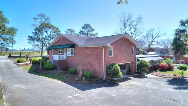 view of property exterior featuring a garage