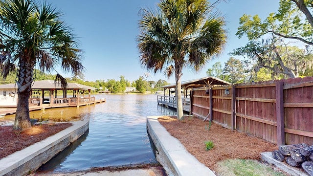 406 Scenic Rt, Cordele, GA 31015 - dock area with a gazebo, a water view, and fence