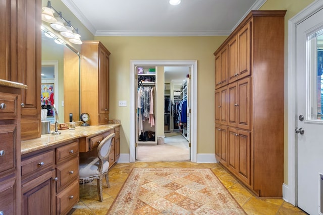 bathroom with crown molding and vanity