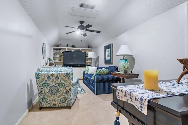 living room featuring light colored carpet and lofted ceiling