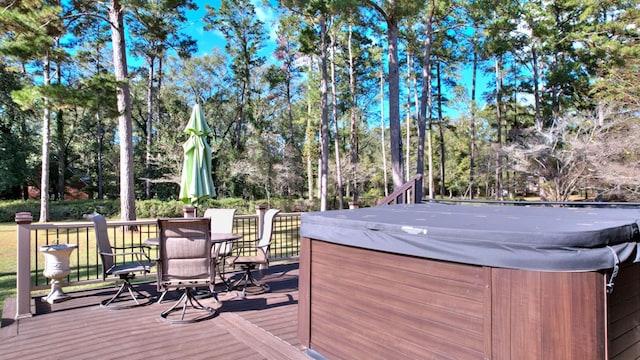 deck featuring a hot tub