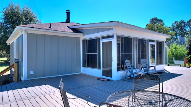 deck featuring a sunroom