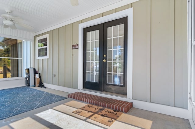 property entrance featuring ceiling fan and french doors