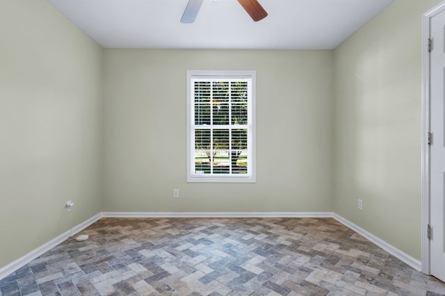 unfurnished room featuring ceiling fan