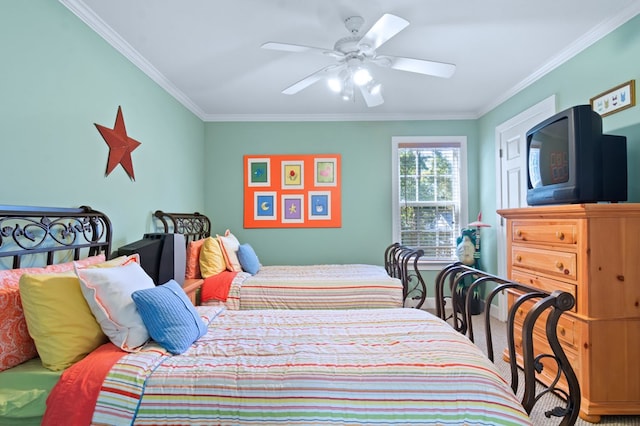 bedroom with a ceiling fan and crown molding