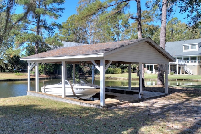 view of dock featuring a water view and boat lift