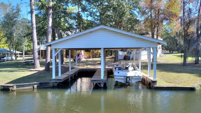 dock area featuring a water view and a yard