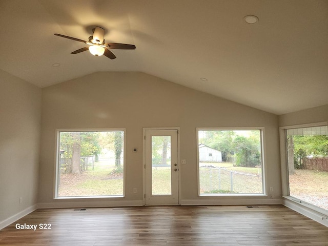 interior space featuring vaulted ceiling, ceiling fan, and light hardwood / wood-style flooring