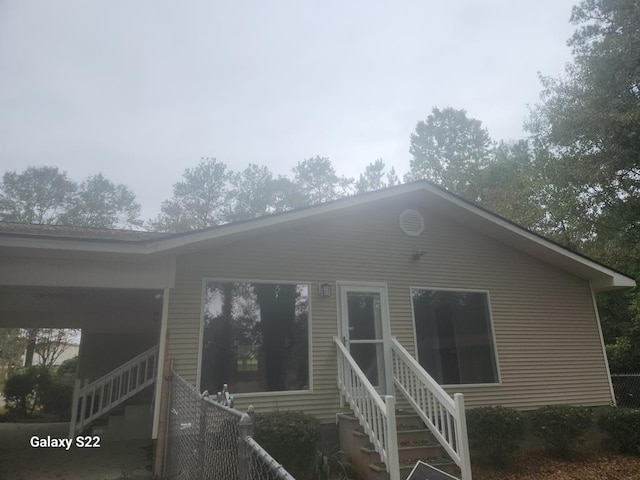 view of front facade featuring a carport