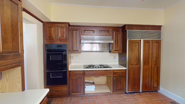 kitchen with crown molding and black appliances