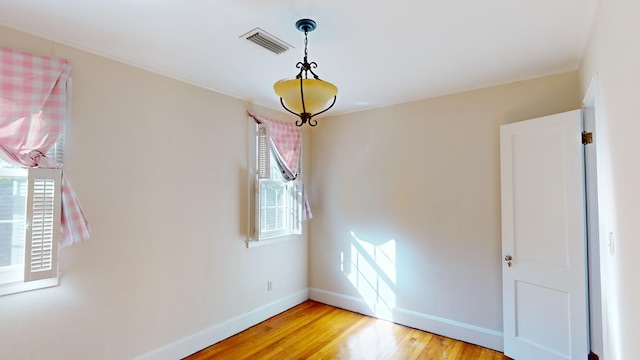 empty room with light wood-type flooring