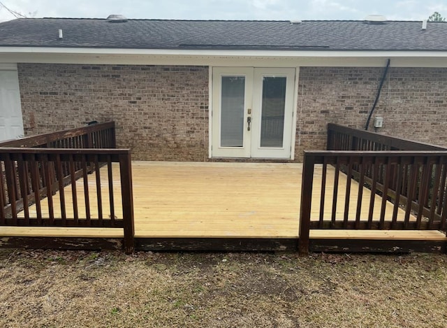 wooden terrace featuring french doors