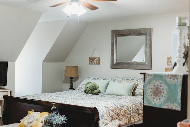 bedroom with ceiling fan and lofted ceiling