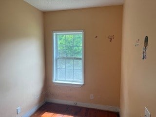 726 Oglethorpe Ave, Americus, GA 31709 - empty room with baseboards