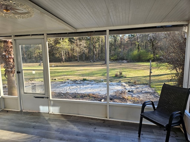 unfurnished sunroom featuring wood ceiling