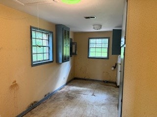 113 Sharon Cir, Americus, GA 31709 - spare room featuring attic access