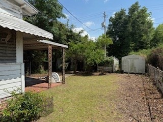 306 E 13th Ave, Cordele, GA 31015 - view of yard featuring a carport