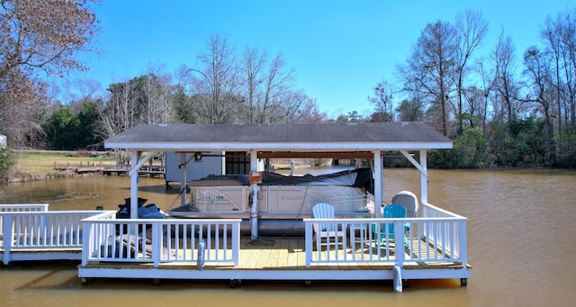 dock area featuring a water view and boat lift