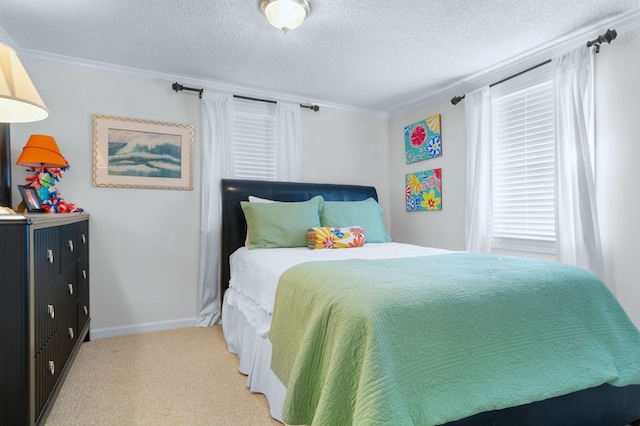 bedroom with light carpet, multiple windows, and a textured ceiling