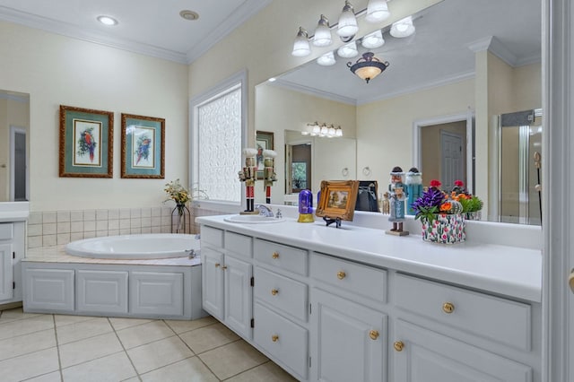 bathroom with a tub, tile patterned floors, vanity, and crown molding