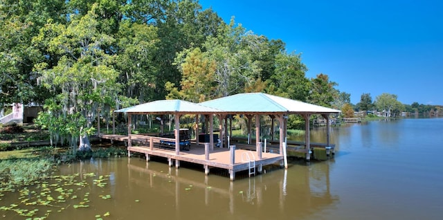 dock area featuring a gazebo and a water view