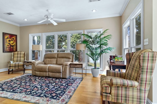 interior space featuring ceiling fan and a healthy amount of sunlight