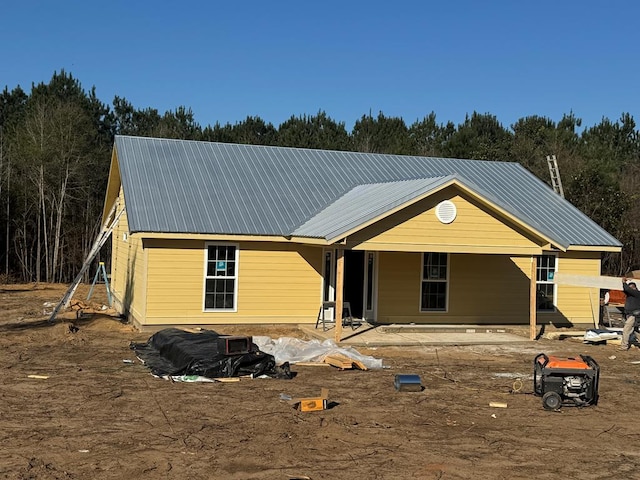 view of front of house featuring metal roof