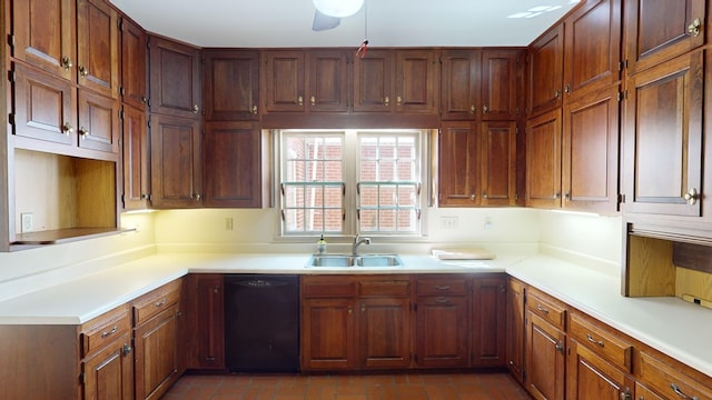 815 E 19th Ave, Cordele, GA 31015 - kitchen featuring black dishwasher, a sink, brick patterned flooring, and light countertops